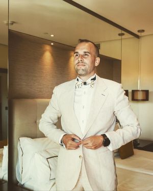 Beige Linen Suit with White Dress Shirt and Bow Tie