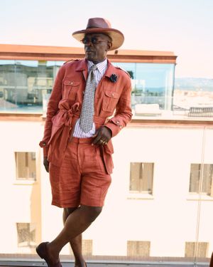 Rust Utility Jacket with Bermuda Shorts and Patterned Tie